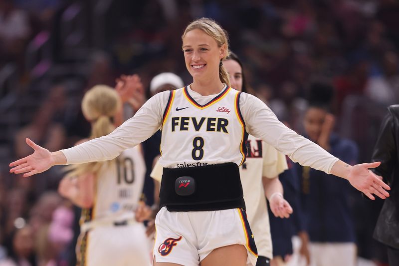 CHICAGO, ILLINOIS - JULY 27: Sophie Cunningham #8 of the Indiana Fever high fives teammates against the Chicago Sky during the second half at the United Center on July 27, 2025 in Chicago, Illinois. NOTE TO USER: User expressly acknowledges and agrees that, by downloading and or using this photograph, User is consenting to the terms and conditions of the Getty Images License Agreement. (Photo by Michael Reaves/Getty Images)