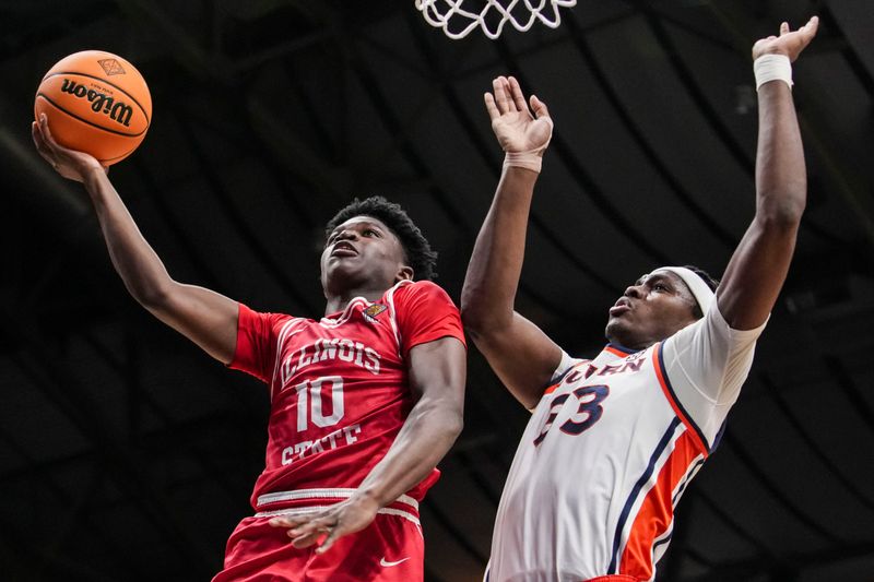 Illinois State Redbirds guard Ty'reek Coleman (10) goes up for a basket against Auburn Tigers forward Sebastian Williams-Adams (33) on Thursday, April 2, 2026, during an NIT semifinals matchup at Hinkle Fieldhouse in Indianapolis.