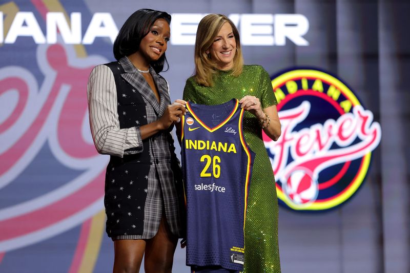 Apr 13, 2026; New York, NY, USA; WNBA Commissioner Cathy Engelbert (right) poses for photos with Raven Johnson who was selected tenth overall by the Indiana Fever during the 2026 WNBA Draft at The Shed at Hudson Yards. Mandatory Credit: Brad Penner-Imagn Images