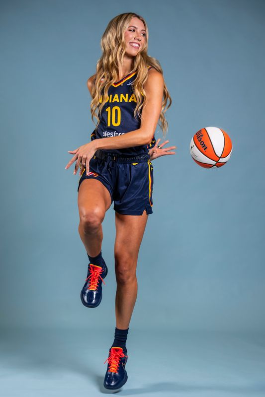 Indiana Fever guard Lexie Hull (10) poses for a photo Wednesday, April 22, 2026, during media day at Gainbridge Fieldhouse in Indianapolis.