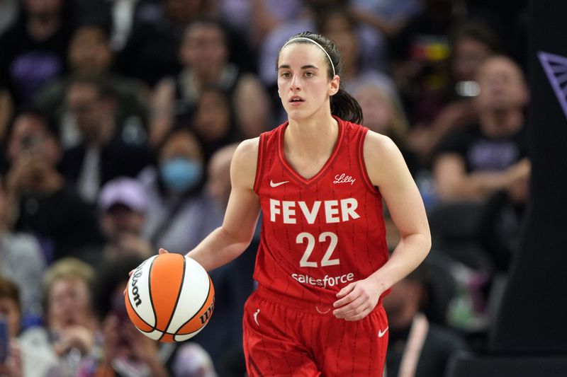 Jun 19, 2025; San Francisco, California, USA; Indiana Fever guard Caitlin Clark (22) dribbles against the Golden State Valkyries during the fourth quarter at Chase Center. Mandatory Credit: Darren Yamashita-Imagn Images