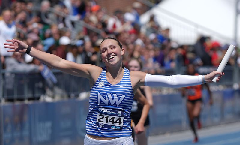 Waukee Northwest’s anchor runner Katie Willits celebrates after winning the girls 4x200 relay at the Drake Relays on April 24, in Des Moines.