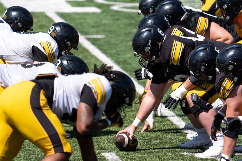 Iowa offensive lineman Josh Janowski (63) lines up at center April 25, 2026 during the team’s spring practice at Kinnick Stadium in Iowa City, Iowa.