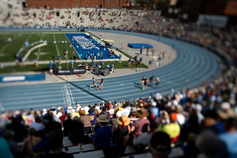 Collegiate athletes run during the Drake Relays on April 25, 2026, at Drake Stadium in Des Moines.