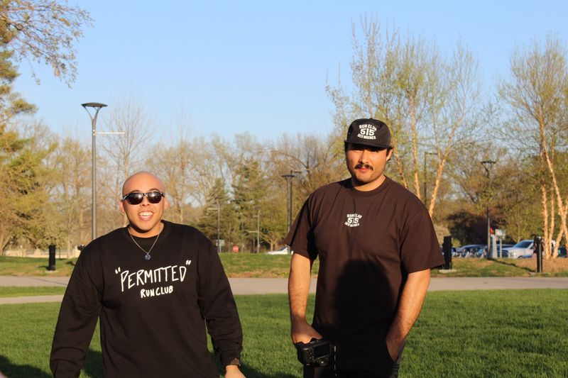 The founders of 515 Run Club, Nico Robinson (left) and Anthony Arroyo at Water Works Park before a Monday night run around Gray's Lake. Kate Kealey/The Register