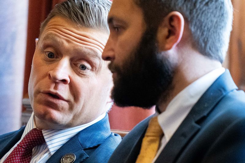 State Sen. Mike Bousselot speaks with House Majority Leader Bobby Kaufmann on May 2, 2026, at the Iowa State Capitol.