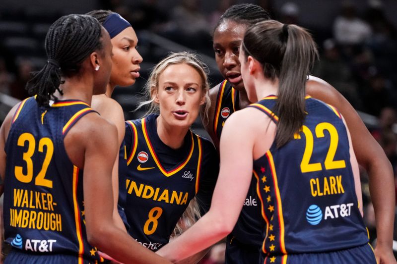 The Indiana Fever huddle up Saturday, May 2, 2026, during the first half of a preseason game at Gainbridge Fieldhouse in Indianapolis.