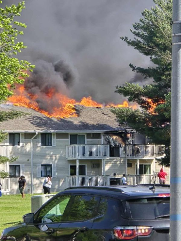 A fire fully engulfed the top floors of an apartment building in the Evergreen Terrace Apartments on the southside of Des Moines on Monday, May 4.