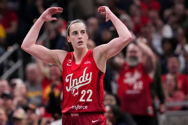 Indiana Fever guard Caitlin Clark (22) gets the crowd excited Saturday, May 9, 2026, during the second half of the Feverâ€™s season opener game at Gainbridge Fieldhouse in Indianapolis. The Dallas Wings defeated the Indiana Fever, 107-104.