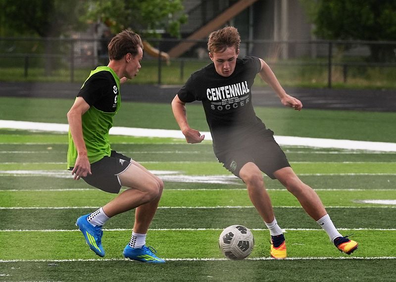 Ankeny Centennial’s forward Tate Duax drives with the ball during practice at the school’s field on May 11, 2026 in Ankeny, Iowa.