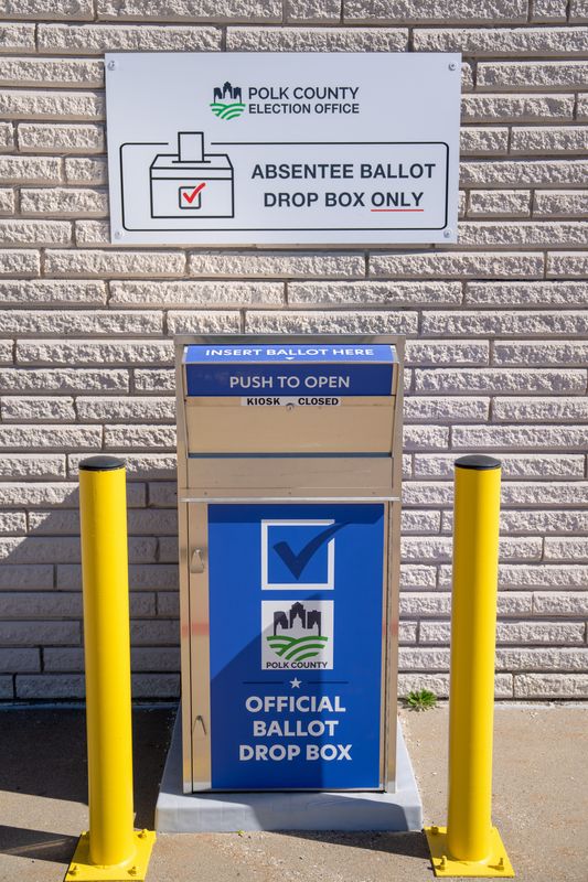 An absentee ballot drop box sits outside the Polk County Election Office, May 13, 2026.