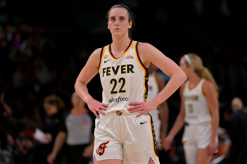 Indiana Fever guard Caitlin Clark looks on against the Los Angeles Sparks at Crypto.com Arena.