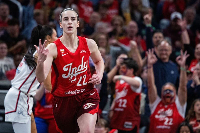 May 15, 2026; Indianapolis, Indiana, USA; Indiana Fever guard Caitlin Clark (22) celebrates a made basket in the first half against the Washington Mystics at Gainbridge Fieldhouse. Mandatory Credit: Trevor Ruszkowski-Imagn Images
