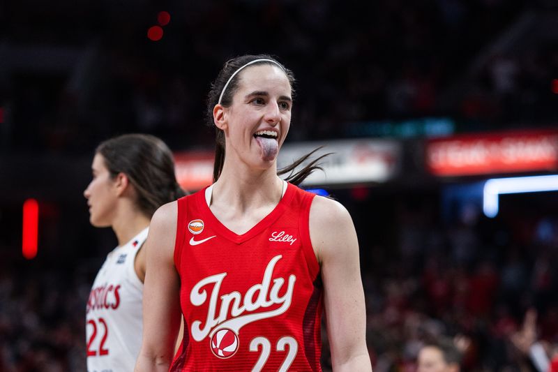 May 15, 2026; Indianapolis, Indiana, USA; Indiana Fever guard Caitlin Clark (22) celebrates a made shot in the second half against the Washington Mystics at Gainbridge Fieldhouse. Mandatory Credit: Trevor Ruszkowski-Imagn Images