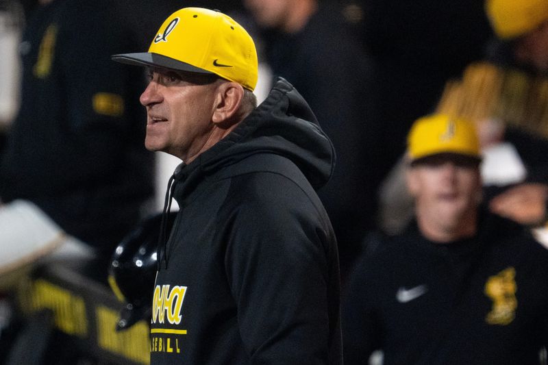 Iowa head coach Rick Heller watches his team compete against the Illinois Fighting Illini on May 1, 2026, during a Big Ten baseball game at Duane Banks Field in Iowa City, Iowa.