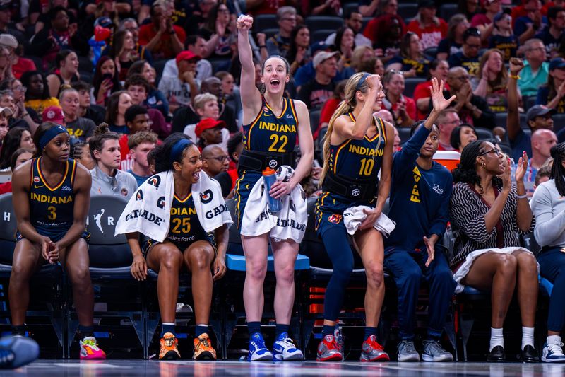 Players on the Indiana Fever bench react during the second half of an WNBA basketball game against the Seattle Storm on Sunday, May 17, 2026, at Gainbridge Fieldhouse.