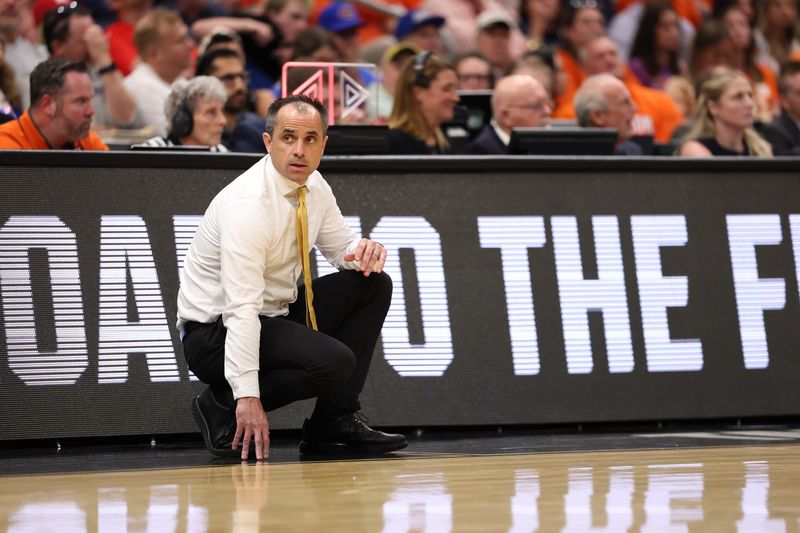 Mar 20, 2026; Tampa, FL, USA; Iowa Hawkeyes head coach Ben McCollum looks on during the second half against the Clemson Tigers during a first round game of the men's 2026 NCAA Tournament at Benchmark International Arena. Mandatory Credit: Matt Pendleton-Imagn Images