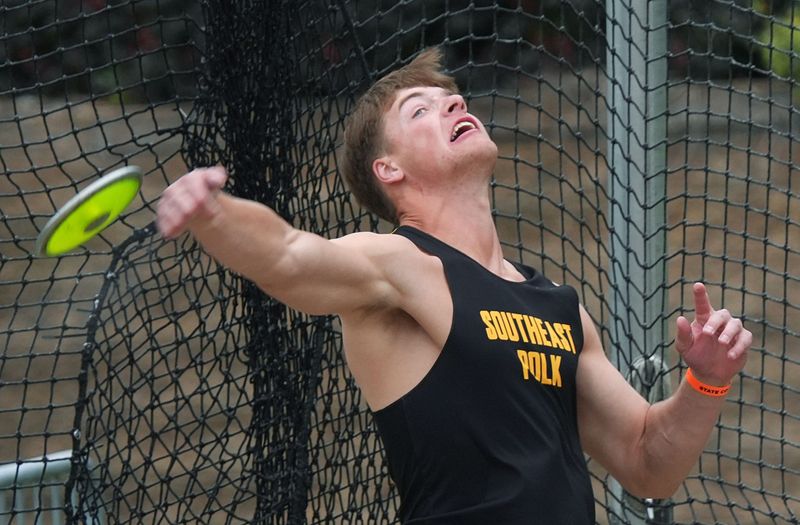 Southeast Polk’s Reece Whinery throws discus during 4A boys discus in the Iowa state high school co-ed track and field at Drake Stadium on May 21, 2026, in Des Moines, Iowa.