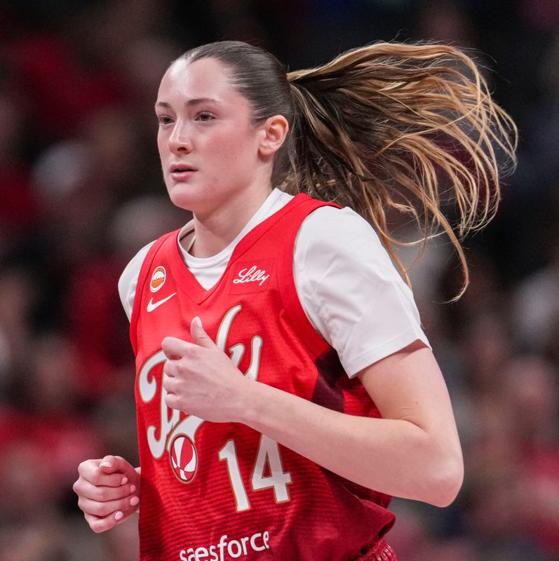Indiana Fever forward Grace VanSlooten (14) runs down the court Friday, May 22, 2026, during the first half of a game against the Golden State Valkyries at Gainbridge Fieldhouse in Indianapolis.
