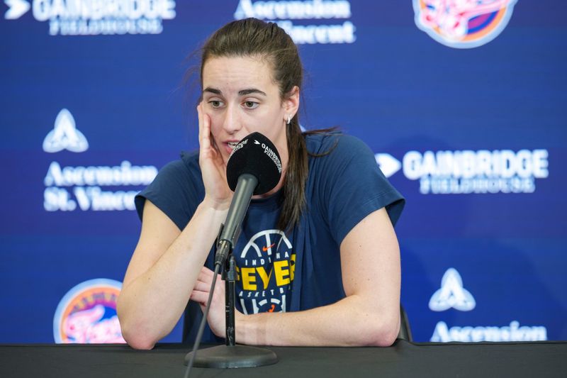 Indiana Fever guard Caitlin Clark talks with media on Friday, May 22, 2026, before a game against the Golden State Valkyries at Gainbridge Fieldhouse in Indianapolis.