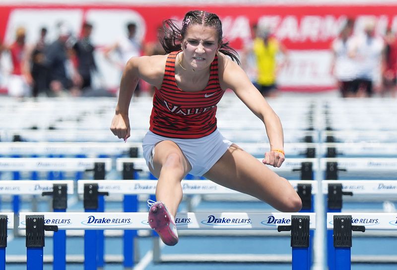 West Des Moines Valley’s Morgan Karr crosses the hurdle the 4A boys 100-meter hurdles final in the final day of the Iowa state high school co-ed track and field at Drake Stadium on May 23, 2026, in Des Moines, Iowa.