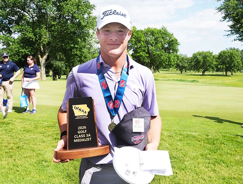 Nevada’s Parker Rodgers celebrates with trophy after winning the 3A boys state golf championship at Gate Park Golf Course on May 27, 2026, in Waterloo, Iowa..