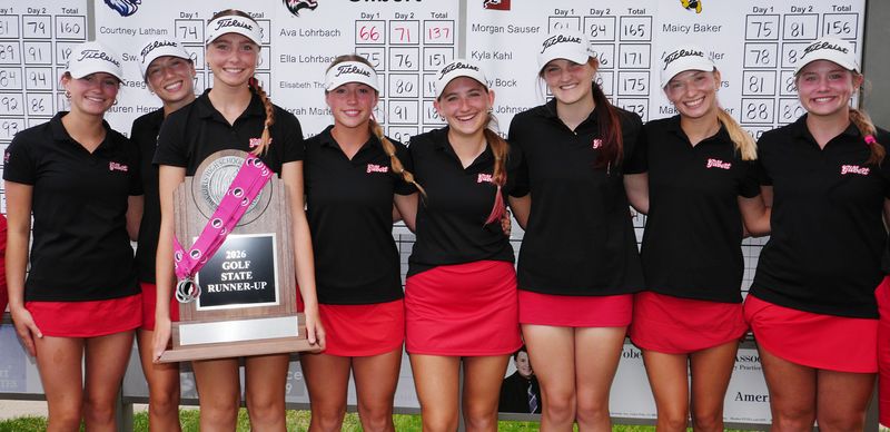 The Gilbert girls golf team celebrates with its Class 3A state runner-up trophy during the 2026 IGHSAU 3A girls state golf meet at the Pheasant Ridge Golf Course on May 29 in Cedar Falls, Iowa.