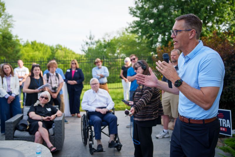 Rep. Randy Feenstra, R-Iowa, campaigns for the Republican nomination for governor during a rally with local residents, Wednesday, May 27, 2026, in West Des Moines, Iowa.