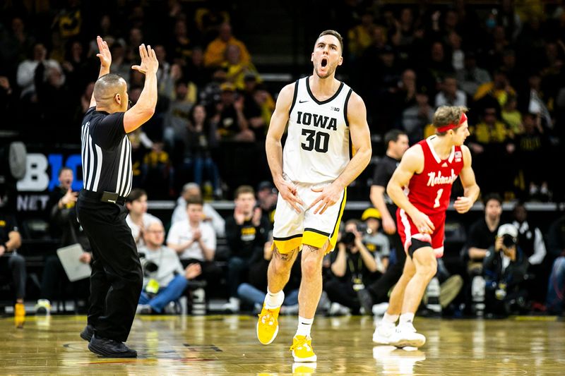 Iowa guard Connor McCaffery (30) reacts after making a 3-point basket during a NCAA Big Ten Conference men's basketball game against Nebraska, Sunday, March 5, 2023, at Carver-Hawkeye Arena in Iowa City, Iowa.

230305 Nebraska Iowa Mbb 036 Jpg