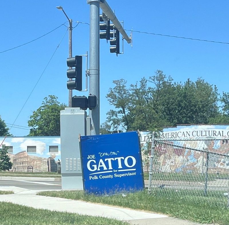 A vandalized campaign sign for Joe Gatto's unsuccessful Polk County supervisor bid reflects disgruntlement over his tie to the unpopular Crow Tow.