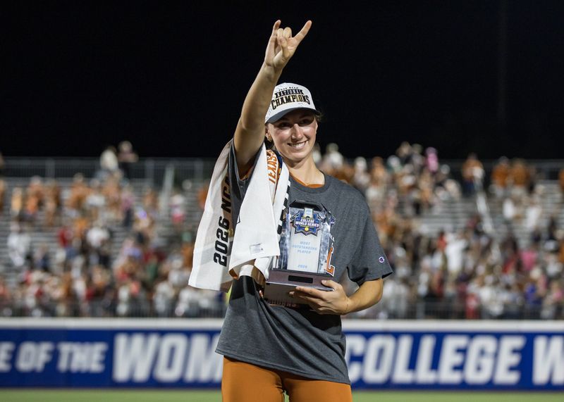 Texas Longhorns pitcher Teagan Kavan (17) reacts after receiving the most outstanding player trophy for Women's College World Series championship