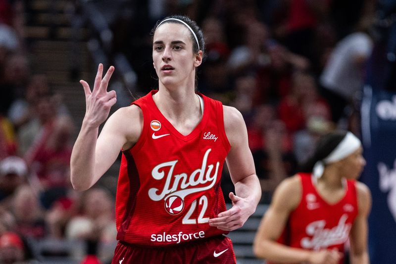 Jun 4, 2026; Indianapolis, Indiana, USA; Indiana Fever guard Caitlin Clark (22) gestures after making a three-point basket in the second half against the Atlanta Dream at Gainbridge Fieldhouse. Mandatory Credit: Trevor Ruszkowski-Imagn Images