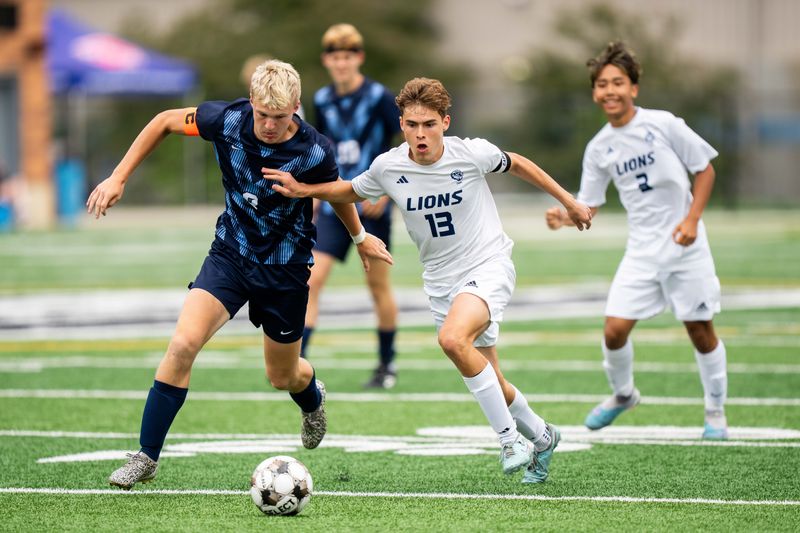 Des Moines Christian's William Mathson (13) got an assist on the goal that sent the Lions to Saturday's state championship game.