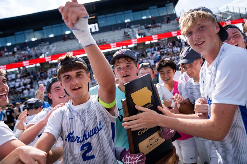Waukee Northwest senior Brody Lind (2) and teammates celebrate after winning the Class 4A state soccer championship over Ankeny Centennial on June 5, 2026, at Mediacom Stadium in Des Moines.