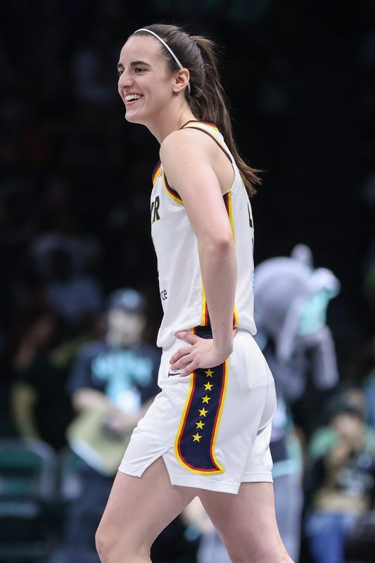 Jun 6, 2026; Brooklyn, New York, USA; Indiana Fever guard Caitlin Clark (22) takes to the court for the start of the game against the New York Liberty at Barclays Center. Mandatory Credit: Wendell Cruz-Imagn Images