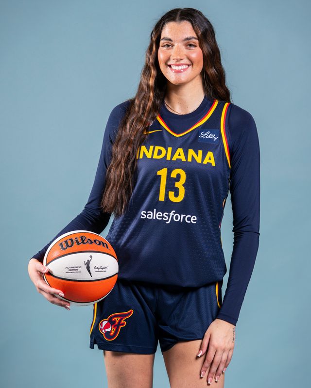Indiana Fever forward Justine Pissott (13) poses for a photo Wednesday, April 22, 2026, during media day at Gainbridge Fieldhouse in Indianapolis.