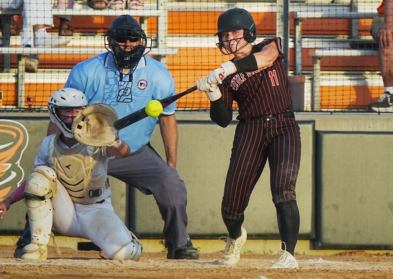 Ames' Mya Geffre (11) hits the ball against Dowling Catholic during the third inning at Ames Softball field on June 16, 2026, in Ames, Iowa.