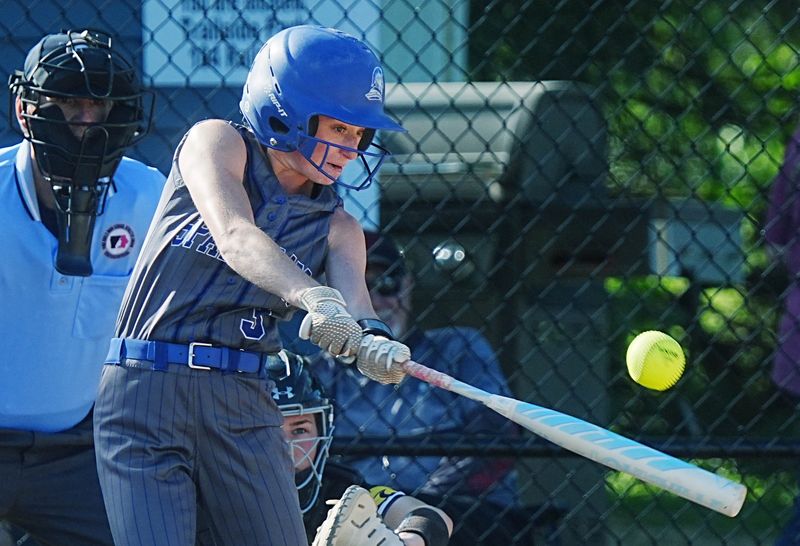 Collins-Maxwell leadoff hitter Cypress Erickson (3) hits the ball for a single against Janesville during the second inning of the Spartans' 16-1 victory over the Wildcats at the Collins-Maxwell Softball Field on June 17 in Collins, Iowa. Erickson and No. 2 hitter Haylee Merryman form a lethal 1-2 punch at the top of the order for the Spartans.