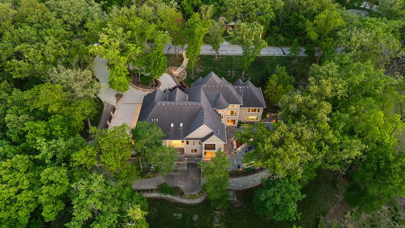 Drone view of home for sale at 12993 Oak Brook Drive, Urbandale.