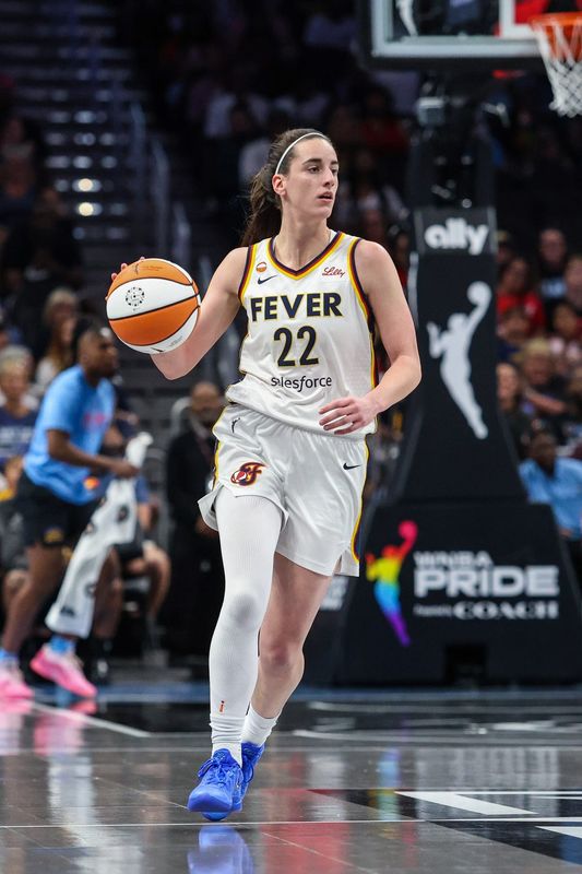 Jun 20, 2026; Atlanta, Georgia, USA; Indiana Fever guard Caitlin Clark (22) dribbles the ball down the court against the Atlanta Dream during the first quarter at State Farm Arena. Mandatory Credit: Jordan Godfree-Imagn Images