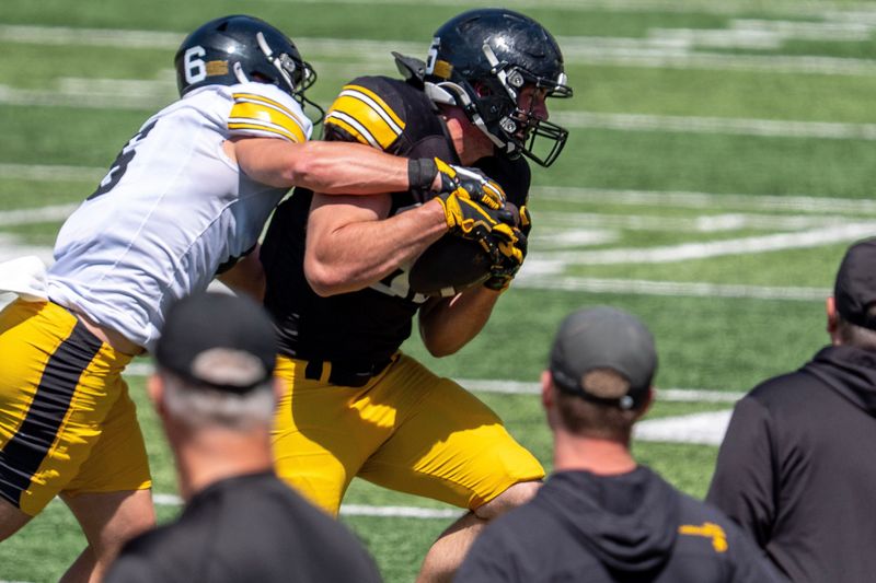 Iowa defensive back Zach Lutmer (6) defends a pass to tight end Thomas Meyer (85) April 25, 2026 during the teamâ€™s spring practice at Kinnick Stadium in Iowa City, Iowa.