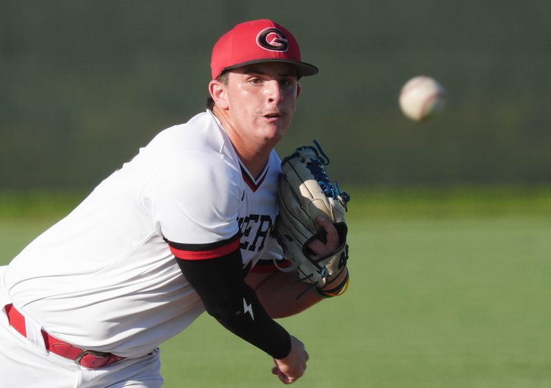 Gilbert pitcher Tripp Sturgill (30) watches a pitch during the Tigers' doubleheader against ADM on June 22 in Gilbert. Sturgill has been brilliant on the mound for the Tigers despite suffering a hamstring injury before the start of the season.