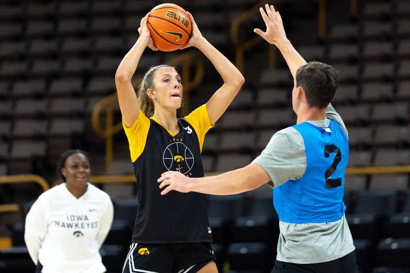 The first media glimpse of McKenna Woliczko in an Iowa women's basketball practice was impressive. She shot the 3 well and showed quickness and speed out of the power-forward position.