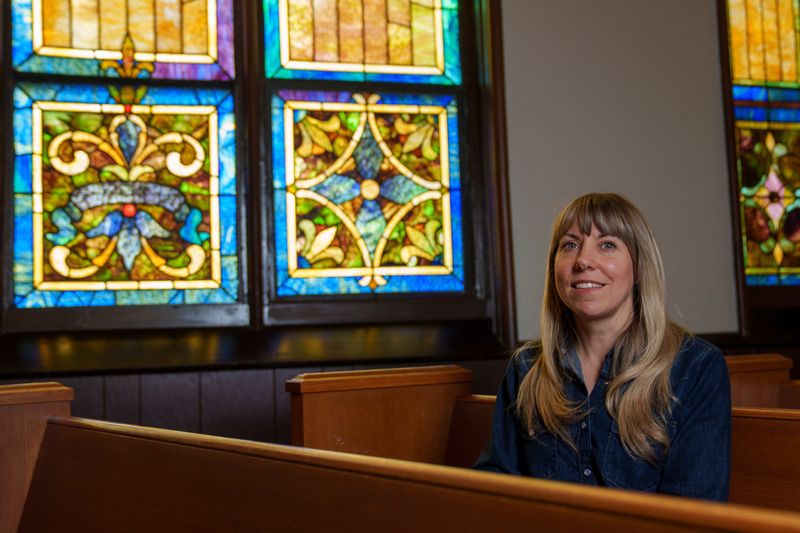 State Sen. Sarah Trone Garriott stands for a portrait a the Capitol Hill Lutheran Church Thursday, June 25, 2026 in Des Moines. She is a Lutheran Minister campaigning in Iowa's 3rd Congressional District. She has served as both a hospital chaplain and congregational pastor.