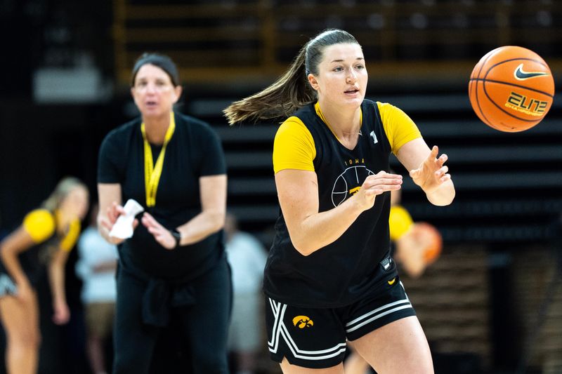 Iowa guard Taylor Stremlow (1) passes the basketball during practice on June 25, 2026, at Carver-Hawkeye Arena in Iowa City, Iowa.