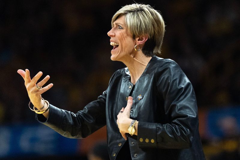 Iowa head coach Jan Jensen reacts March 21, 2026 during a First Round NCAA March Madness game against the Fairleigh Dickinson Knights at Carver-Hawkeye Arena in Iowa City, Iowa.