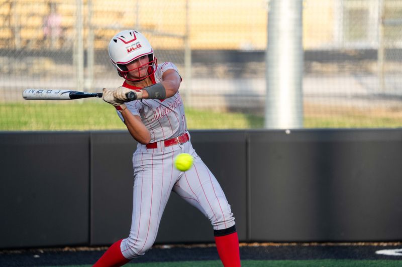 DCG's Addie Abens (19) swings at the ball on June 30, 2026, at Southeast Polk.