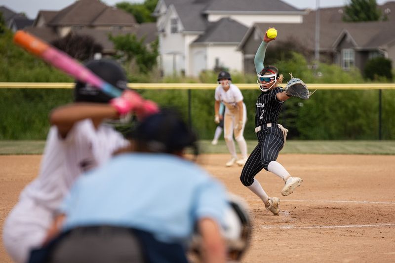 Ankeny Centennial High School’s Peyten Spiegel throws a pitch during a softball game against Dowling Catholic High School on July 1, 2026, in Ankeny, Iowa.
