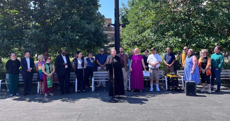Jessica Margrave Schirm, senior pastor at the Grinnell United Church of Christ, speaks at a meeting of faith leaders across the state to call for voting rights protections at Cowles Commons in Des Moines on July 7, 2026.