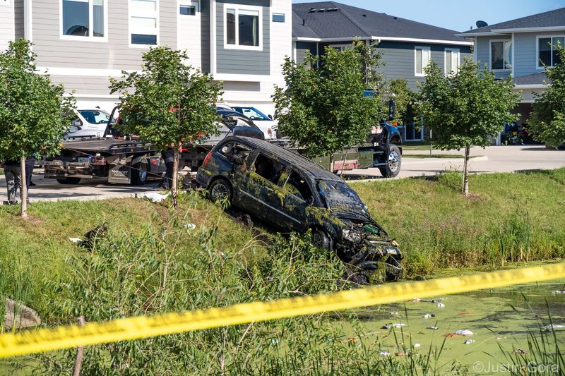 A vehicle with two passengers was found submerged by Waukee Police on Tuesday, July 7. Both passengers have died.